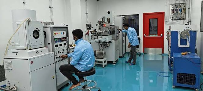 Engineers working in an advanced research and development laboratory